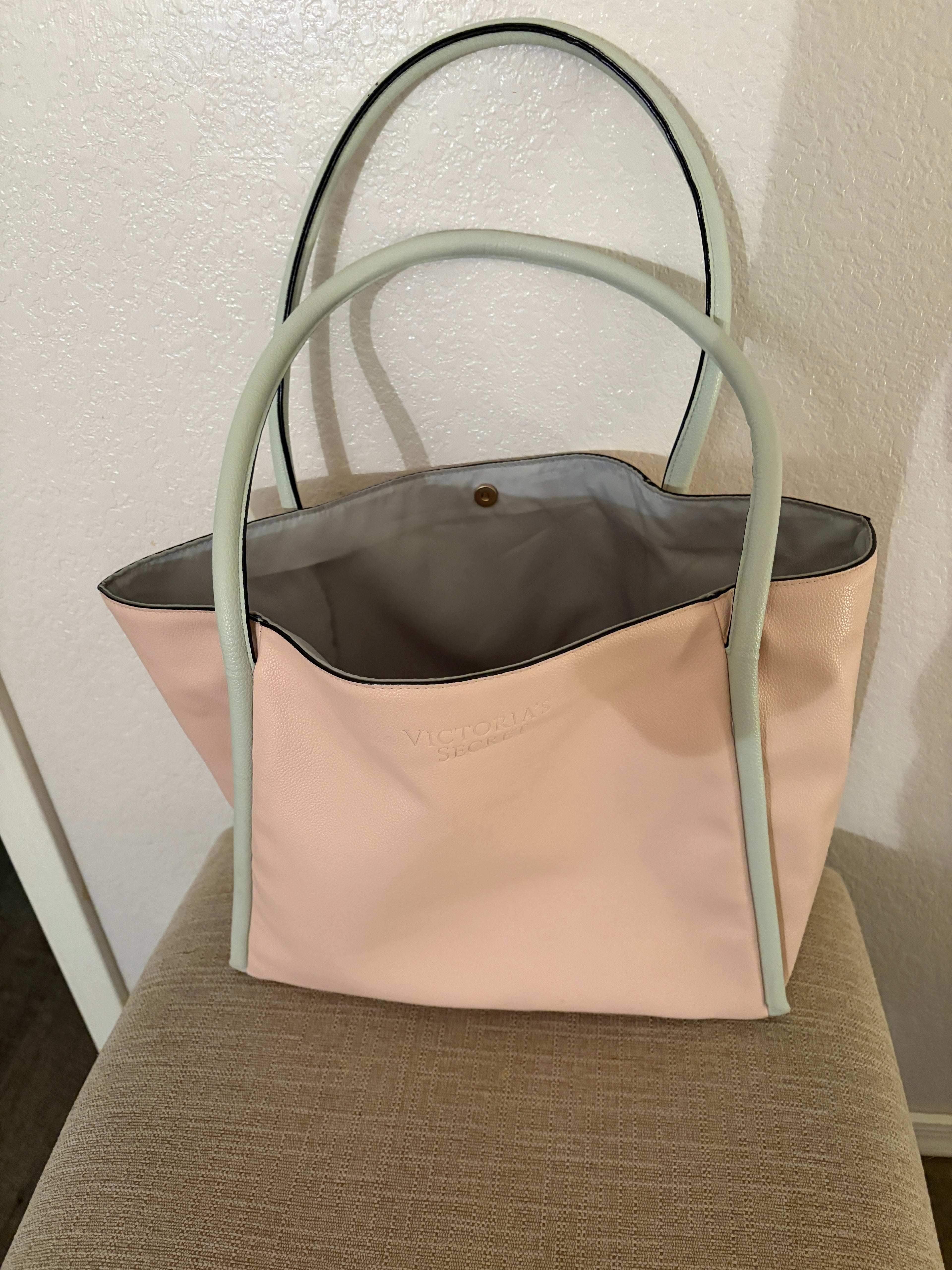 Victoria's Secret salmon pink Tote with snap button closure.