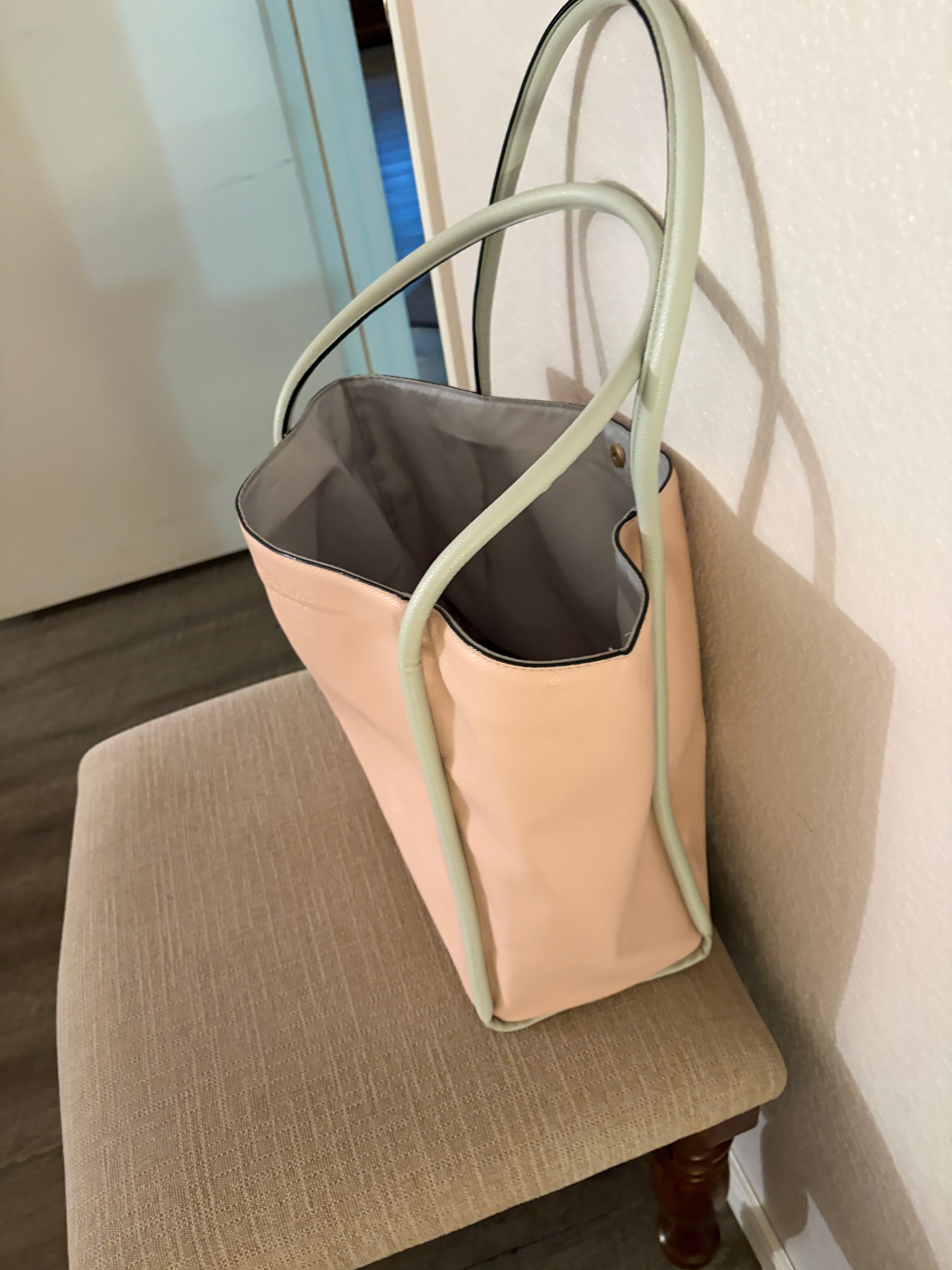 Victoria's Secret salmon pink Tote with snap button closure.
