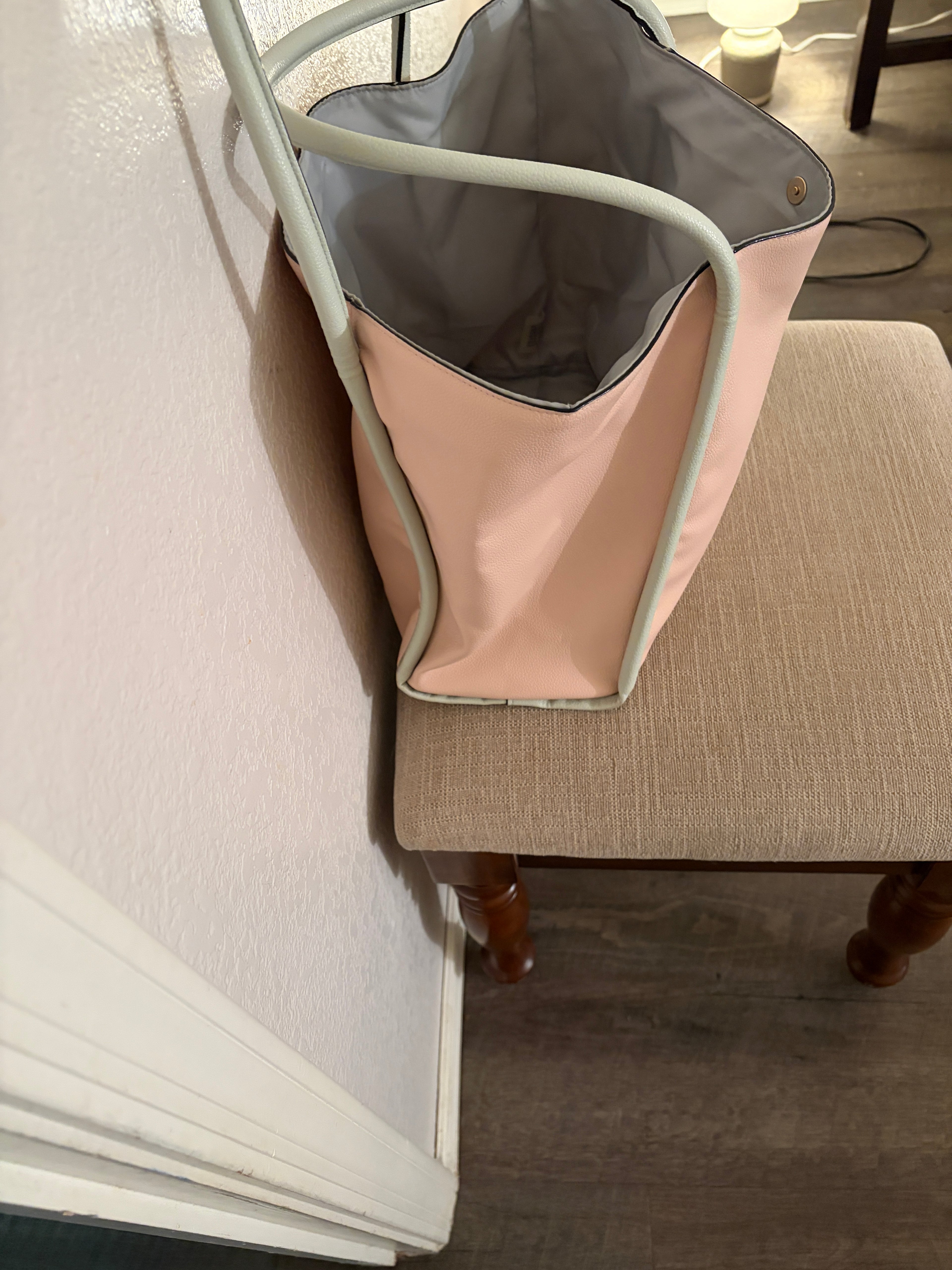 Victoria's Secret salmon pink Tote with snap button closure.